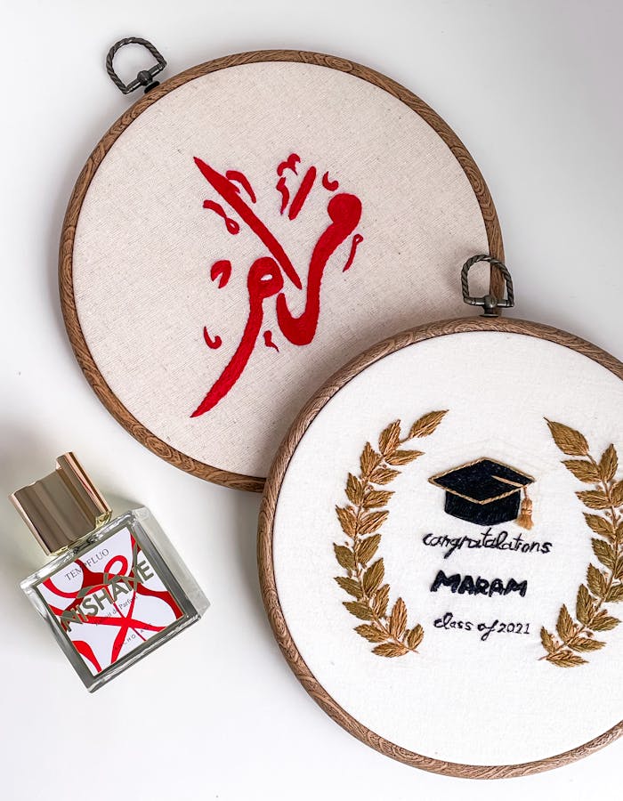 Elegant embroidery with perfume gift for class of 2021 graduate.